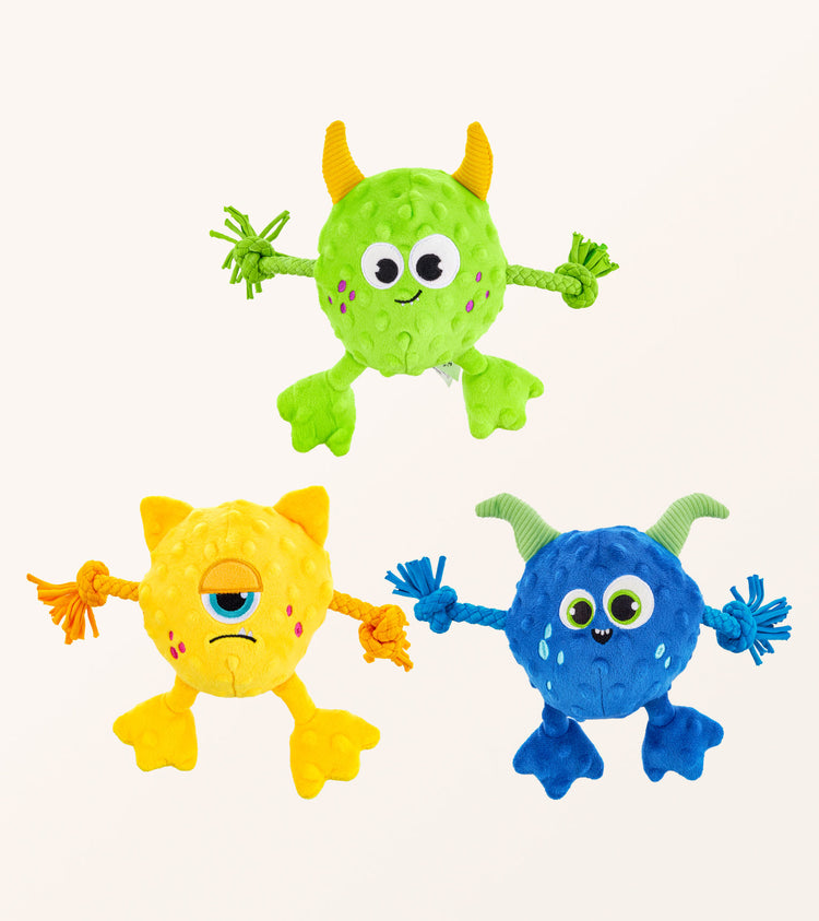 Monsters Chew Toys in yellow, green, and blue colors